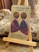 Load image into Gallery viewer, Gorgeous mixed swirl drops on wood