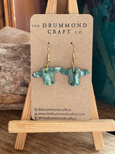 Load image into Gallery viewer, Dark green cow earrings