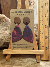 Load image into Gallery viewer, Gorgeous mixed swirl drops on wood