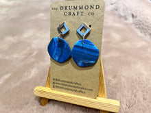 Load image into Gallery viewer, Stunning blue on rose gold drops