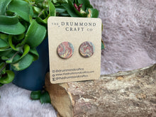 Load image into Gallery viewer, Cufflinks - orange marbled swirl