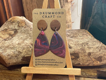 Load image into Gallery viewer, Gorgeous mixed swirl drops on wood