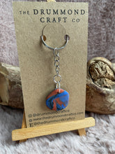 Load image into Gallery viewer, Orange and blue marbled “no waste” keyring
